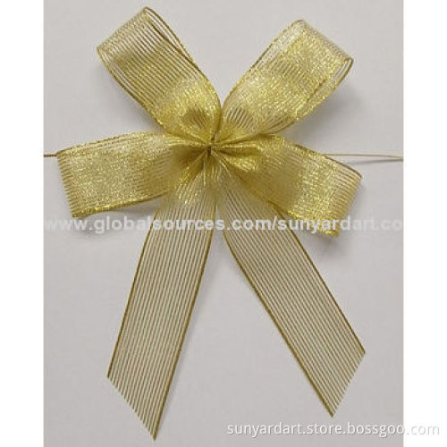 Christmas bow, made of metallic mesh and satin ribbon